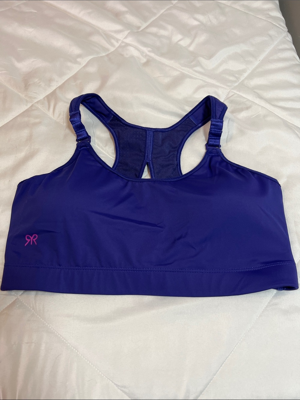 Ruby Ribbon Purple Racerback Sports Bra with Pink Logo